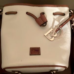 Dooney and Bourke crossbody new cream and tan leather crossbody